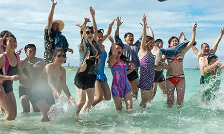 Chinese tourists jumping
